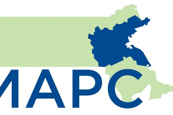 The image is the MAPC logo. A green map of Massachusetts, and the 101 communities MAPC serves colored in a dark blue. Under the map are big, capitalized dark blue letters: MAPC.