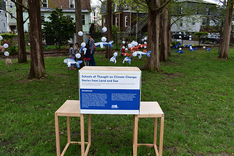 DSC_0047 Schools of Thought display Koi fish made out of construction netting, gloves, and air mask at Wake Up the Earth 2019