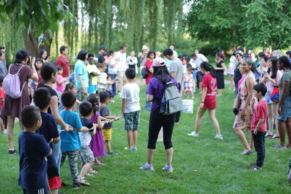 Children participate in a tug-of-war