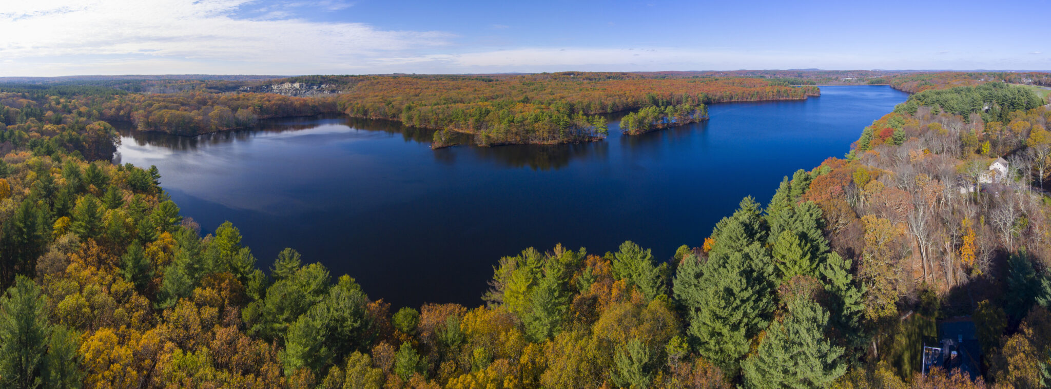 Ashland Reservoir aerial view panorama with fall foliage in Ashland State Park in town of Ashland, Massachusetts MA, USA.