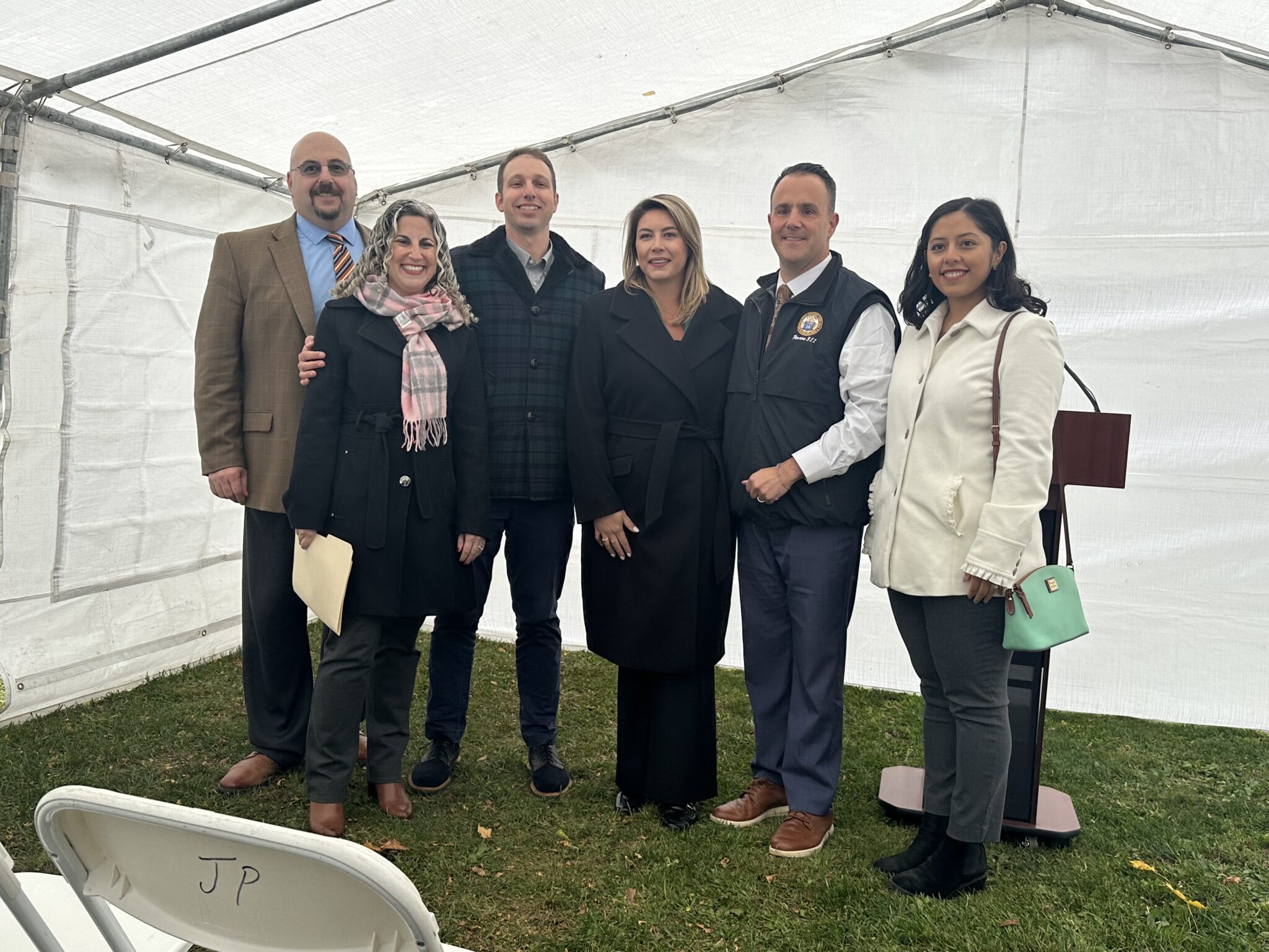 A photo from the Revere Apartment Wi-Fi launch on November 1, 2023. Pictured, from left to right: Executive Director of the Revere Housing Authority Dean Harris, MAPC Deputy Director of Lizzi Weyant, MBI Director of Program Development Josh Eichen, Representative Jessica Ann Giannino, Acting Mayor of Revere Patrick Keefe, and Revere School Committeewoman Jacqueline Monterroso.