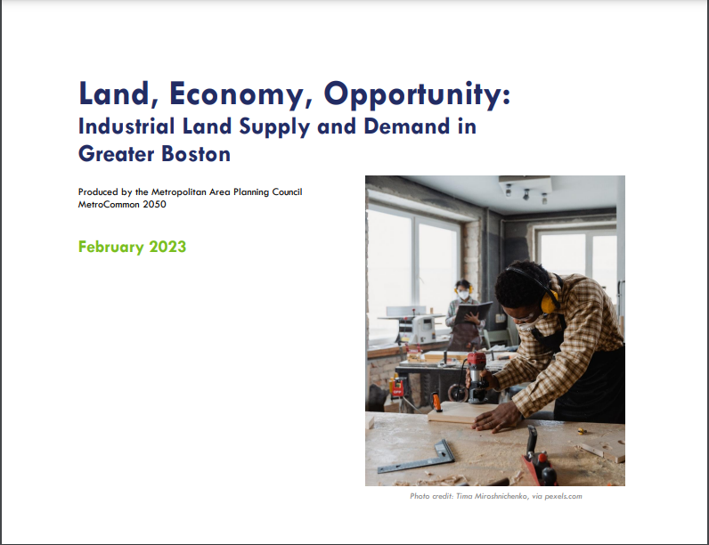 Text says, "Land, Economy, Opportunity: Industrial Land Supply and Demand in Greater Boston. February 2023". There is also a photo of a man working at a table with a tool in a workman's/construction shop. This image is the cover of a report.