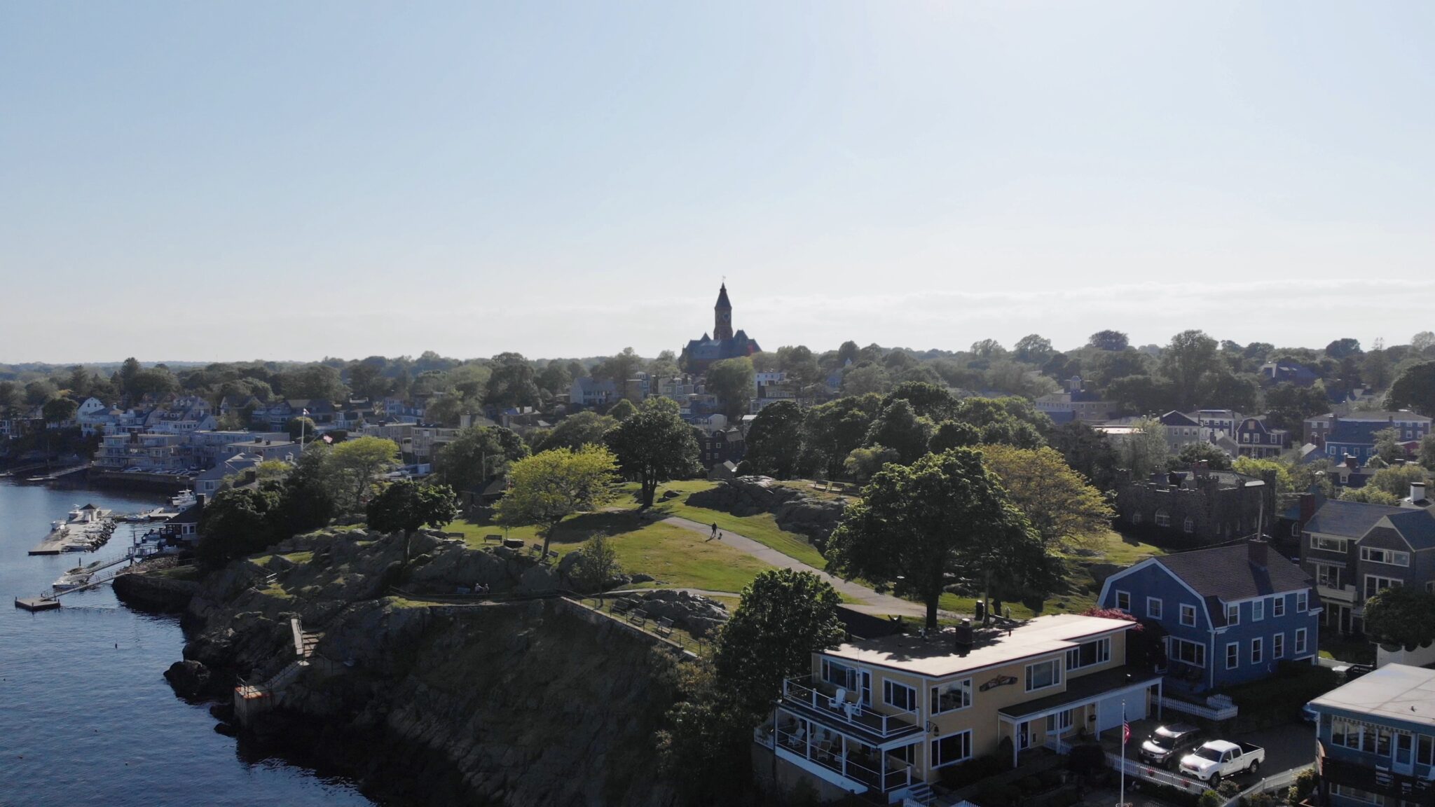 Aerial view of the Town of Marblehead showing historic buildings, a park, and the waterfront.