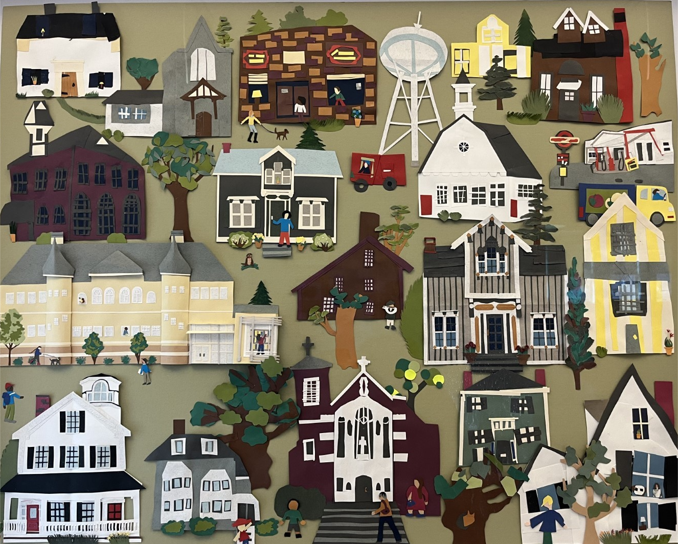 An illustration of a community of homes, buildings, and people.