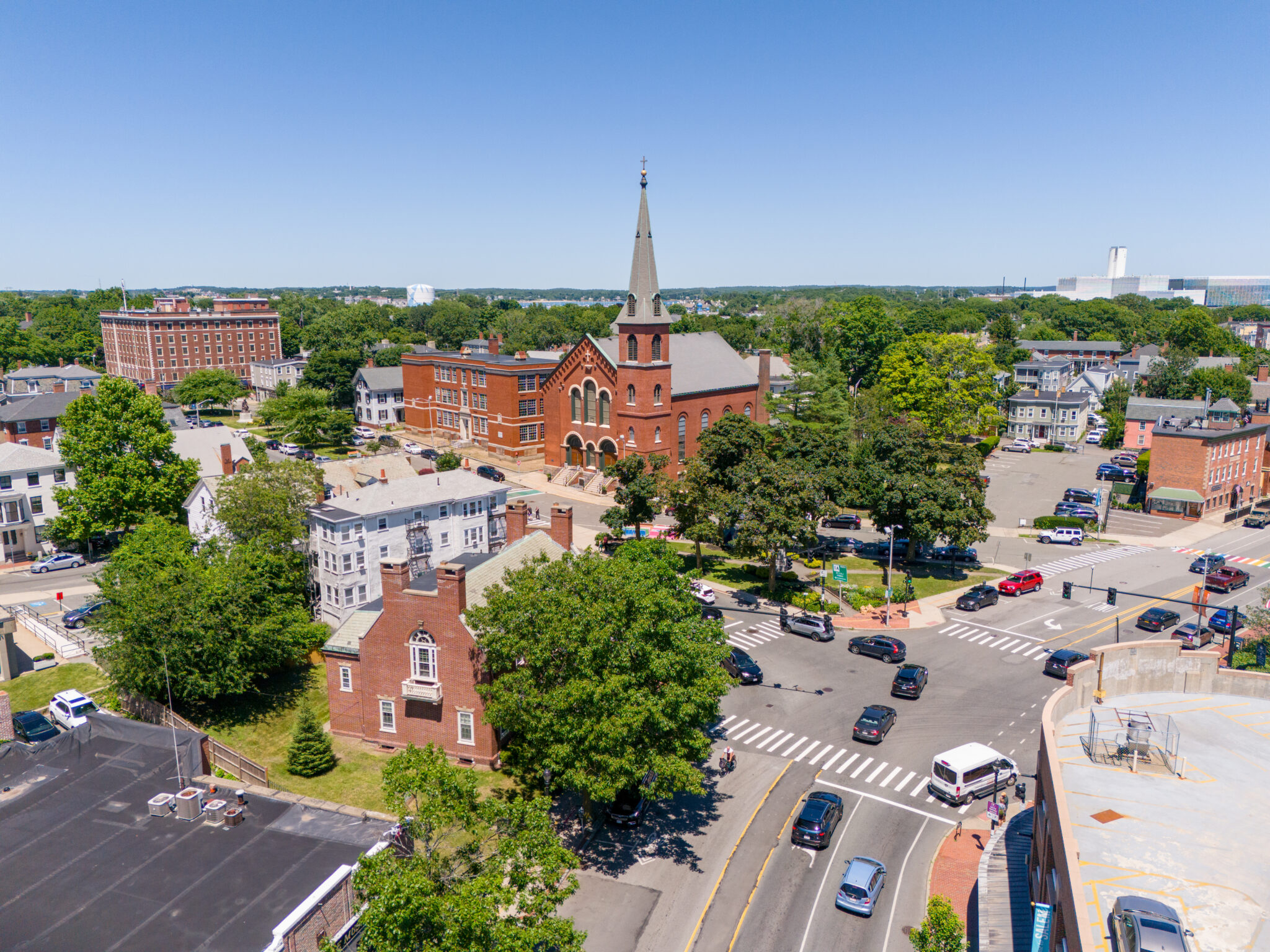 Aerial photo of Salem Massachusetts, USA circa 2024 Aerial photo of Salem, Massachusetts. Numerous roads with cars on them, a church, other buildings, and trees.