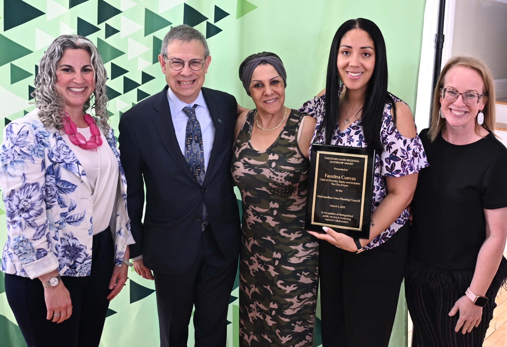 2025 Annual Council Meeting Cuevas Left to right: MAPC Deputy Executive Director Lizzi Weyant, MAPC Executive Director Marc Draisen, Faustina Cuevas' mother, Faustina Cuevas, and MAPC Council President Erin Wortman (Town of Stoneham) | Photo Credit: MAPC