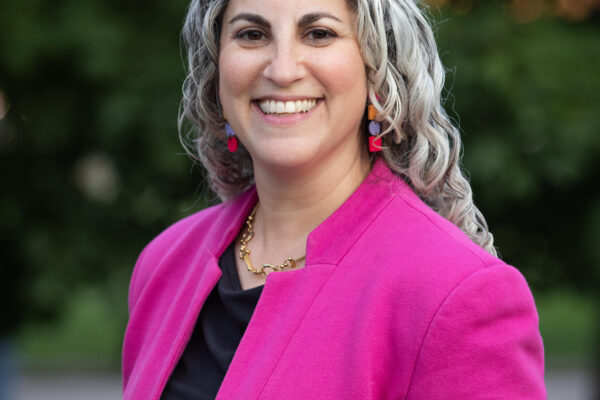 Photo of MAPC Executive Director Lizzi Weyant standing outside