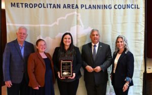Pictured from left to right in front of a light green MAPC banner: MAPC's Martin Pillsbury & Leah Robins, Victoria Mori, Senator Bruce Tarr, and Lizzi Weyant 