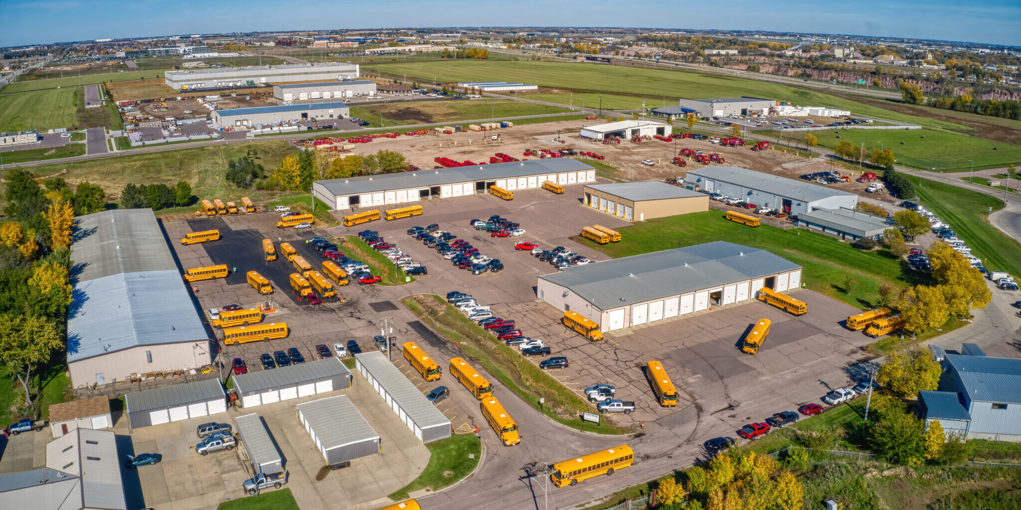 Aerial View of a School Bus Yard during Departure Time