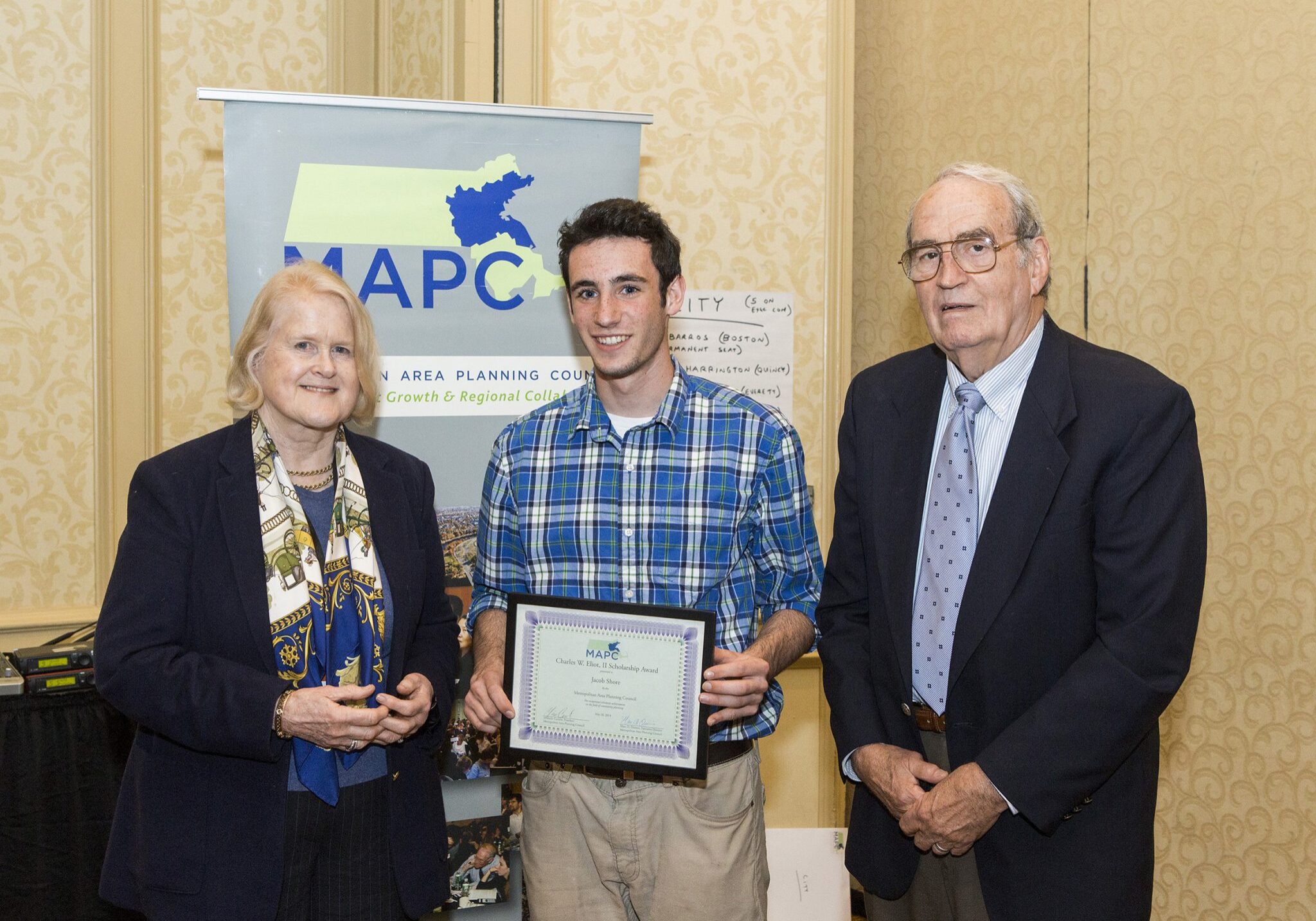 MPCAC058 (l to r) Former Wenham Selectman Harriet Davis, Charles Eliot Scholarship Winner Jacob Shore, and Ipswich Educator Lawrence Eliot. MAPC Annual Council Meeting, May 28, 2014, Newton, Mass. Courtesy Marilyn Humphries.