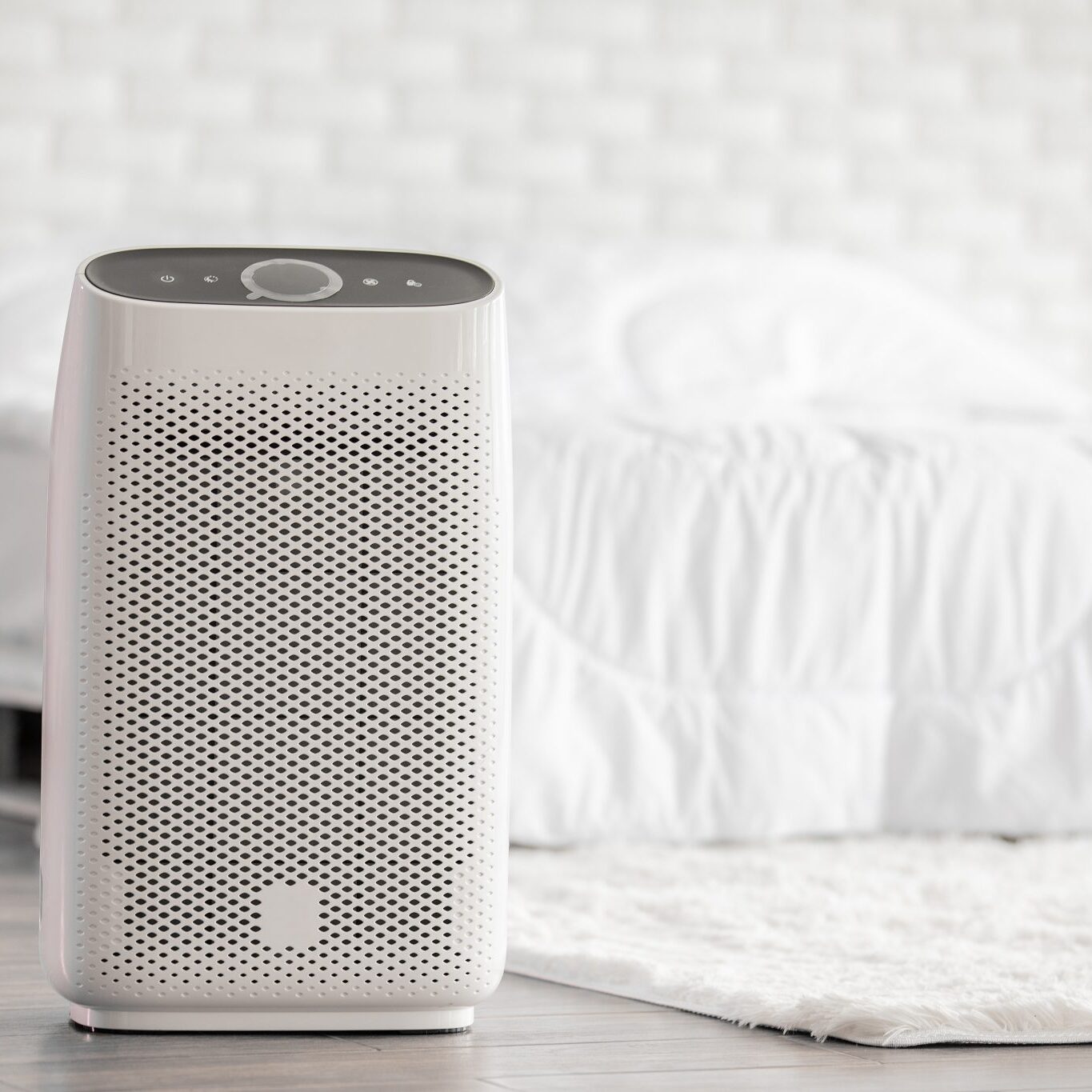 air-purifier-cozy-white-bed-room-filter-cleaning-removing-dust-pm2-5-hepa-home Air purifier in cozy white bed room for filter and cleaning removing dust PM2.5 HEPA in home,for fresh air and healthy life,Air Pollution Concept