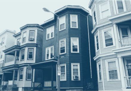 header-homes A colorized photo of numerous attached homes in a row.
